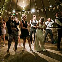 Wedding guests dancing to a wedding band