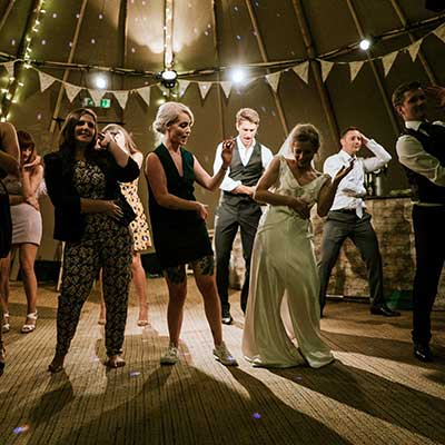 Wedding guests dancing to a wedding band